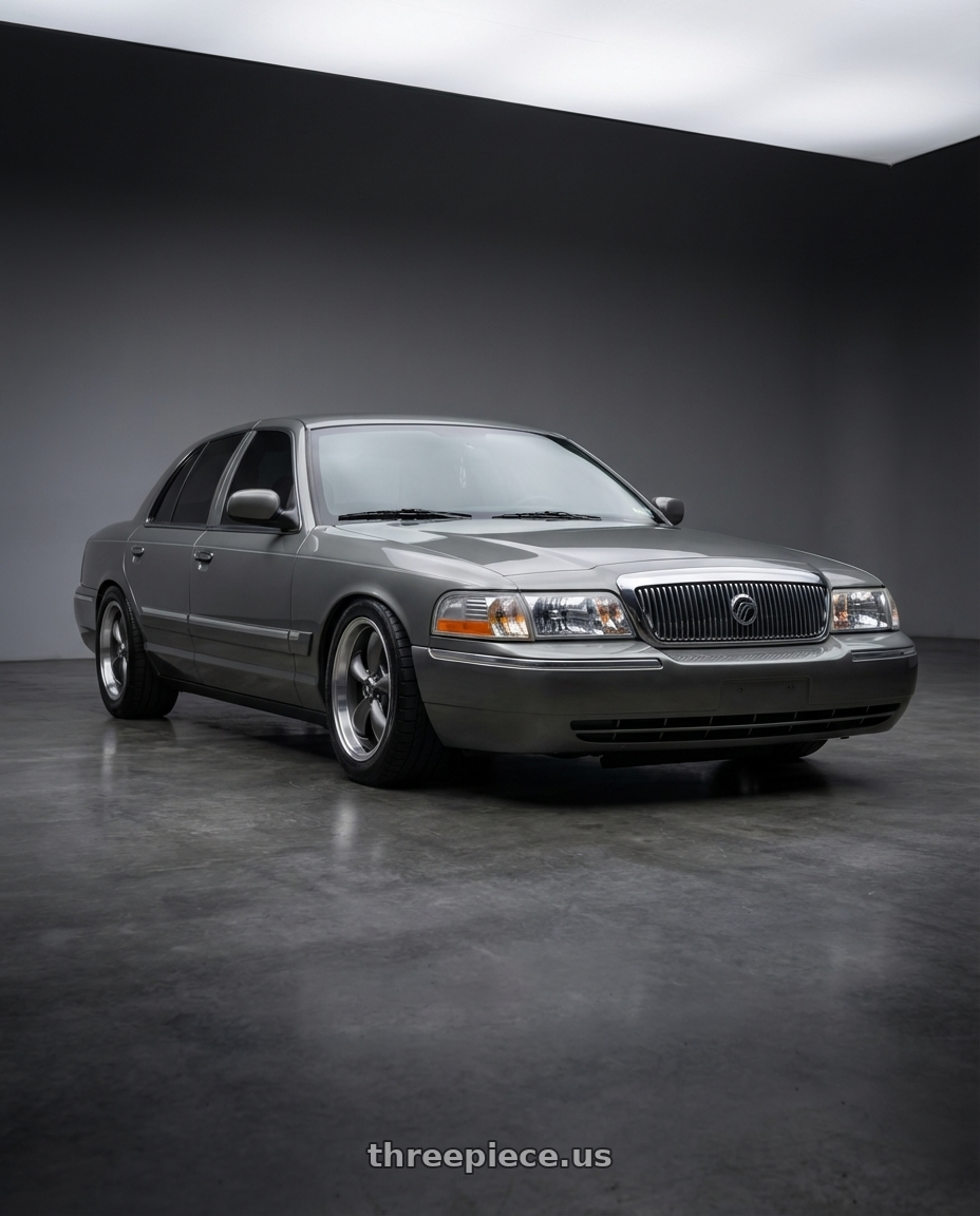2004 Mercury Grand marquis  with American Racing AR105 TORQ THRUST M 5X114.3 18X9 +24 ANTHRACITE W/ MACHINED LIP wheels front three quarter view slammed stance