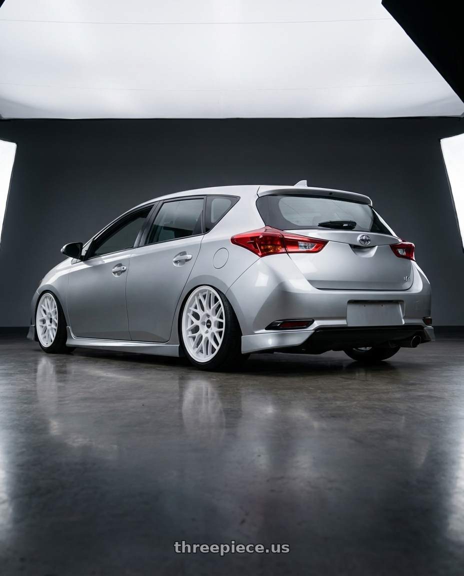 2016 Scion iM with ESR Wheels APEX SERIES APX01 5x100 18x8.5 +30 Gloss White wheels rear three quarter view slight stretch tires