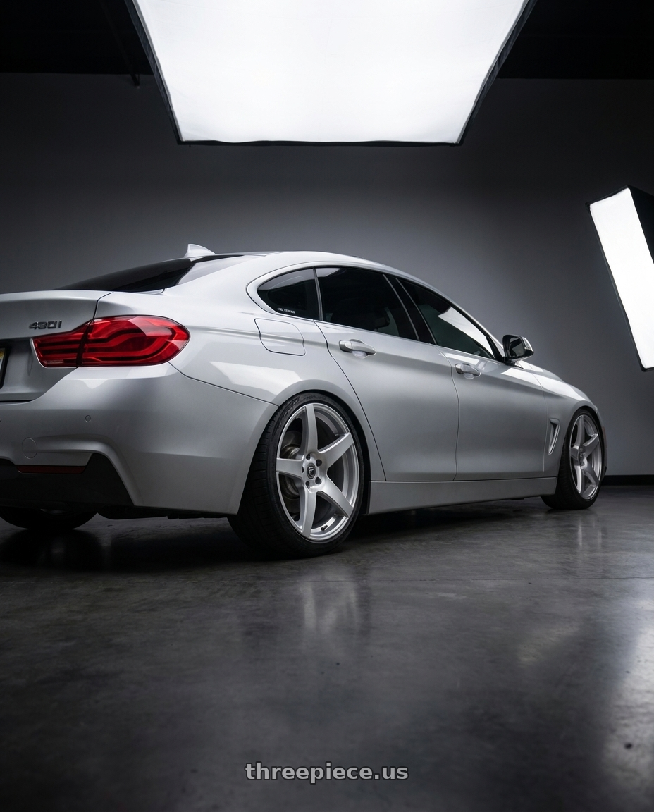 2018 bmw 430i with Forgestar CF5 5x114.3 19x9 +35 Gloss Silver wheels rear three quarter view slight stretch tires