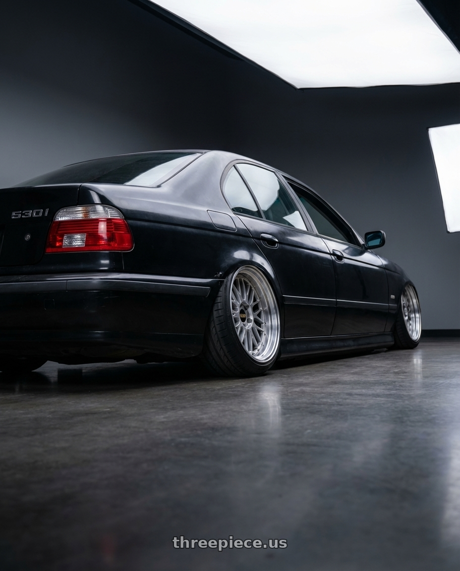 2005 BMW, 530i, Sun-faded Black with BBS LM 5x114.3 18x10.0+20 Diamond Silver wheels rear three quarter view extreme stretch tires
