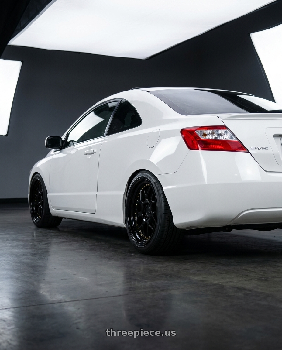 2008 honda civic si coupe with Aodhan DS01 5x114.3 18x9.5+22 Gloss Black W /Gold Rivets wheels rear three quarter view meaty tires