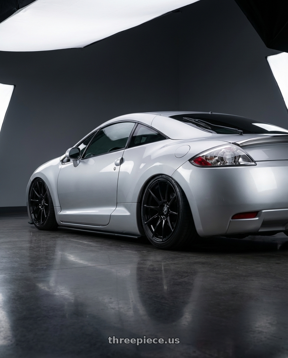 2010 Mitsubishi Eclipse with Forgestar CF10 5x114.3 19x9 +35 Gloss Black wheels rear three quarter view slight stretch tires