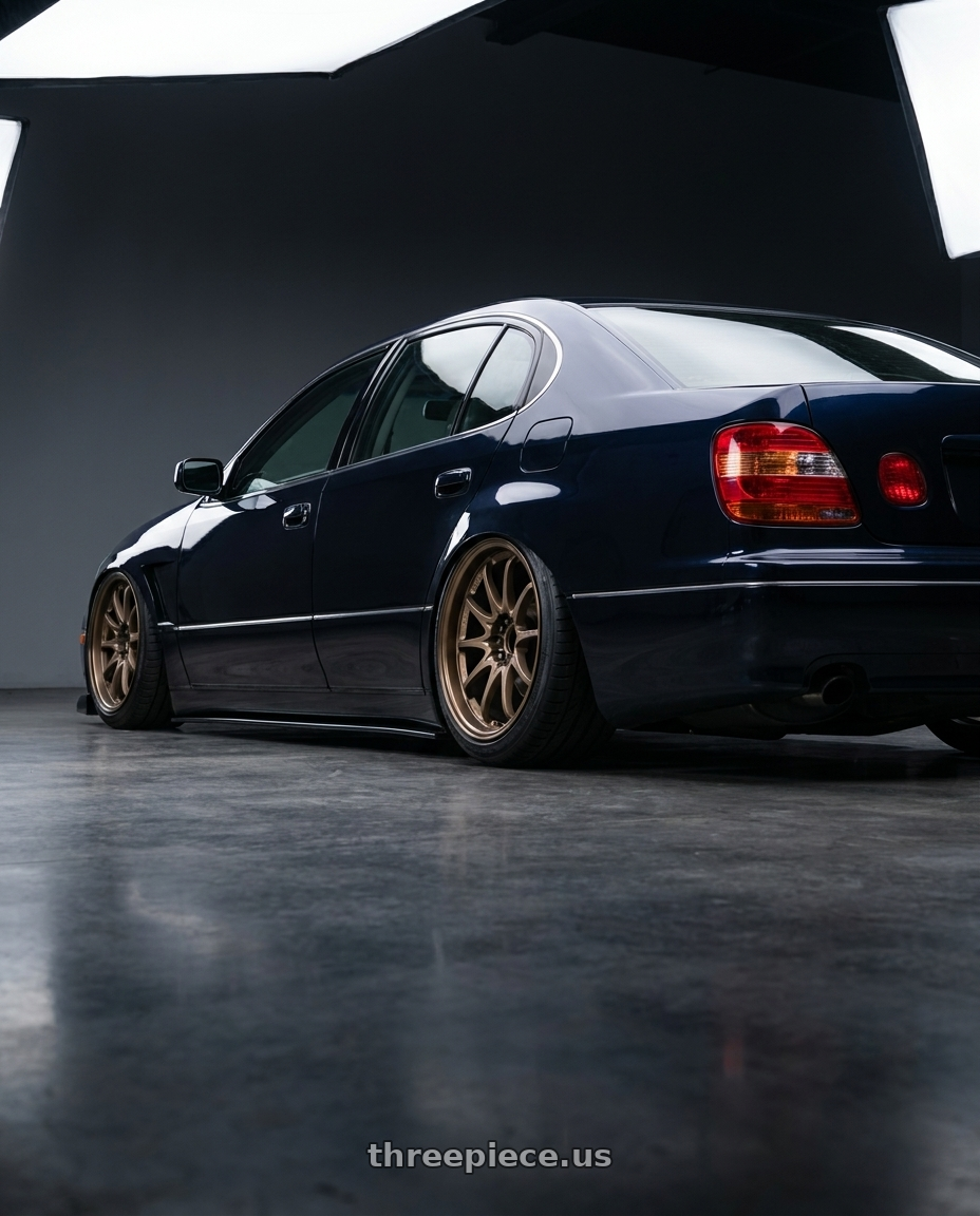 2004 LEXUS GS300 with Volk Racing CE28N 5x114.3 18x8.5 +30 BRONZE wheels rear three quarter view slight stretch tires