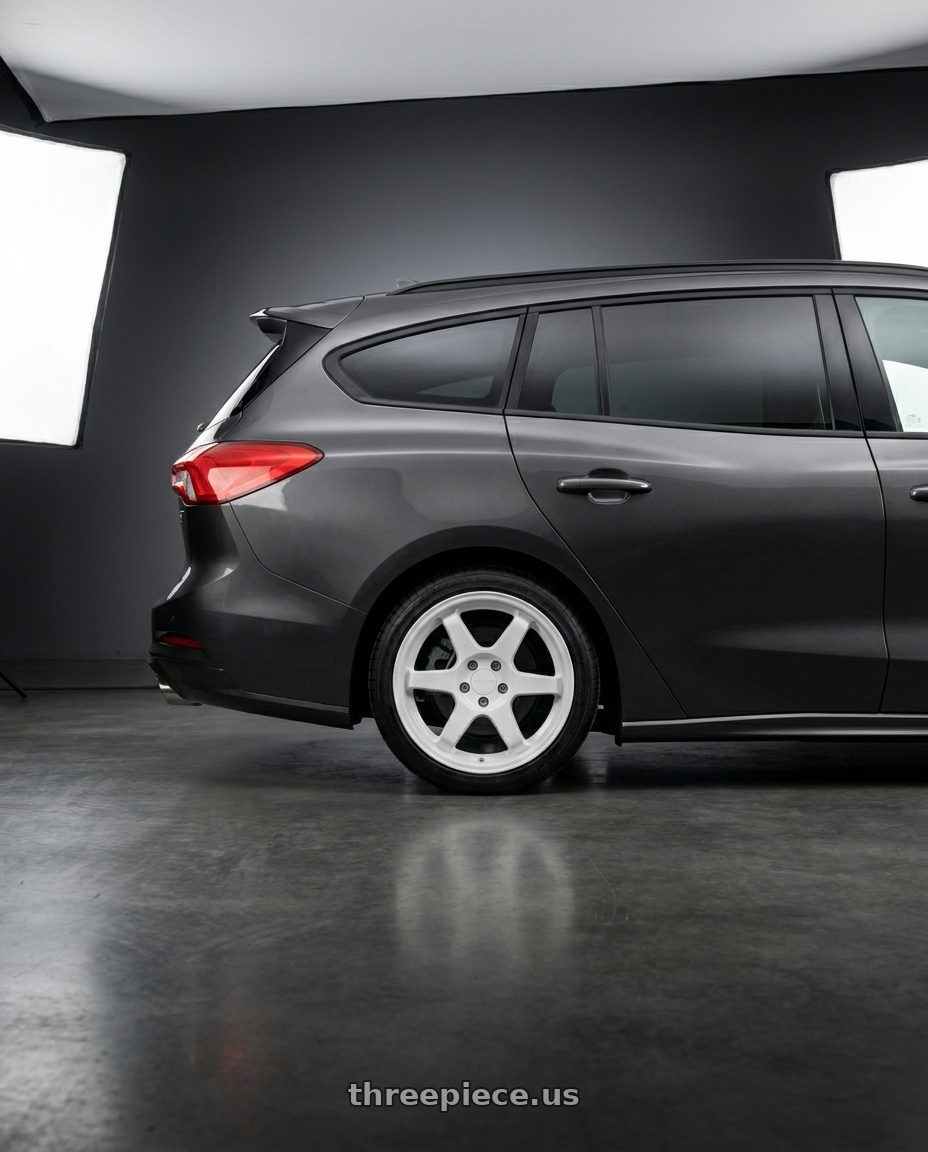 2023 Focus Wagon St with 9six9 SIX-1 5x112 18X8.5 +35 Competition White wheels rear three quarter view square tires