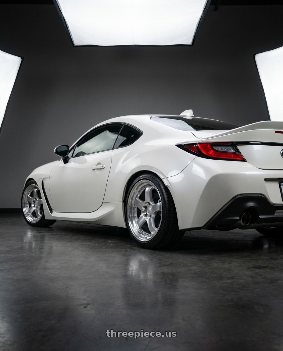 2026 Toyota gr86 with Aodhan AH03 5x100 18x9.5+35 Silver w/Machined Face wheels rear three quarter view square tires