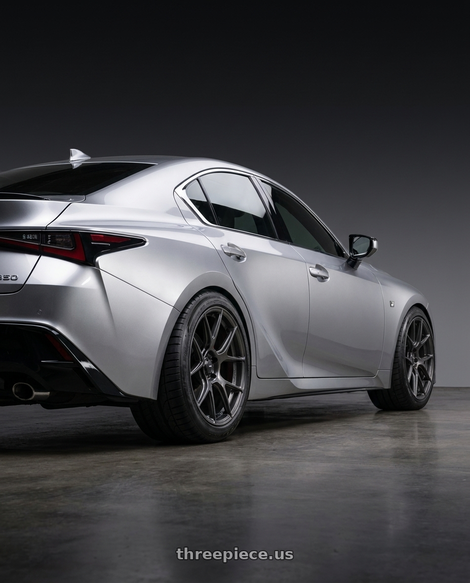 2026 Lexus IS350 with Konig Ampliform 5x114.3 20x11+50 Dark Metallic Graphite wheels rear three quarter view meaty tires