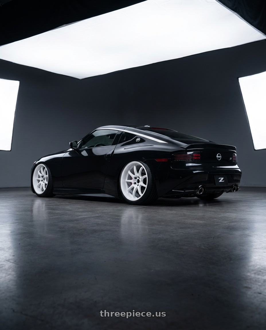 2025 Nissan Z with Work Emotion D9r 5x114.3 19x10.5 +15 White wheels rear three quarter view slight stretch tires