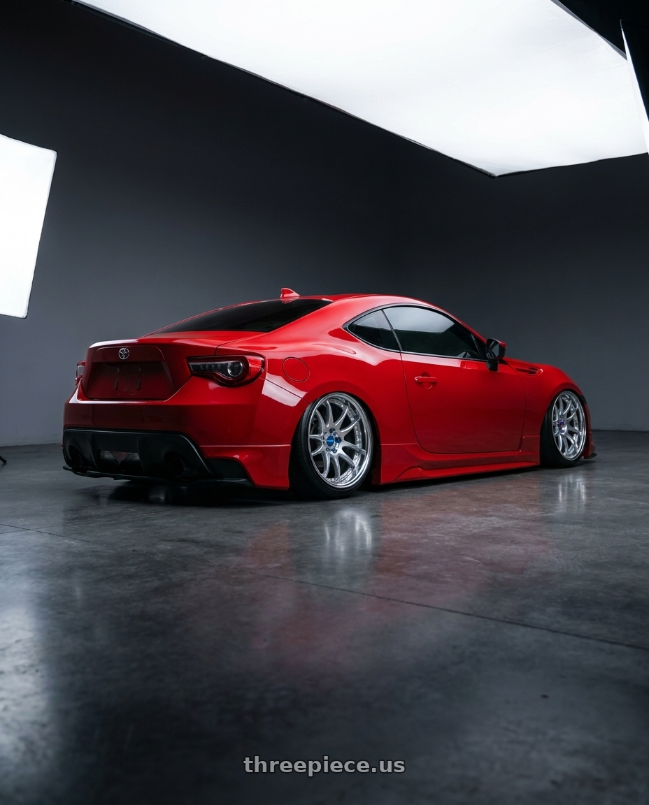 2017 Toyota 86 base m7y with Work Emotion CR 3P wheels rear three quarter view slight stretch tires
