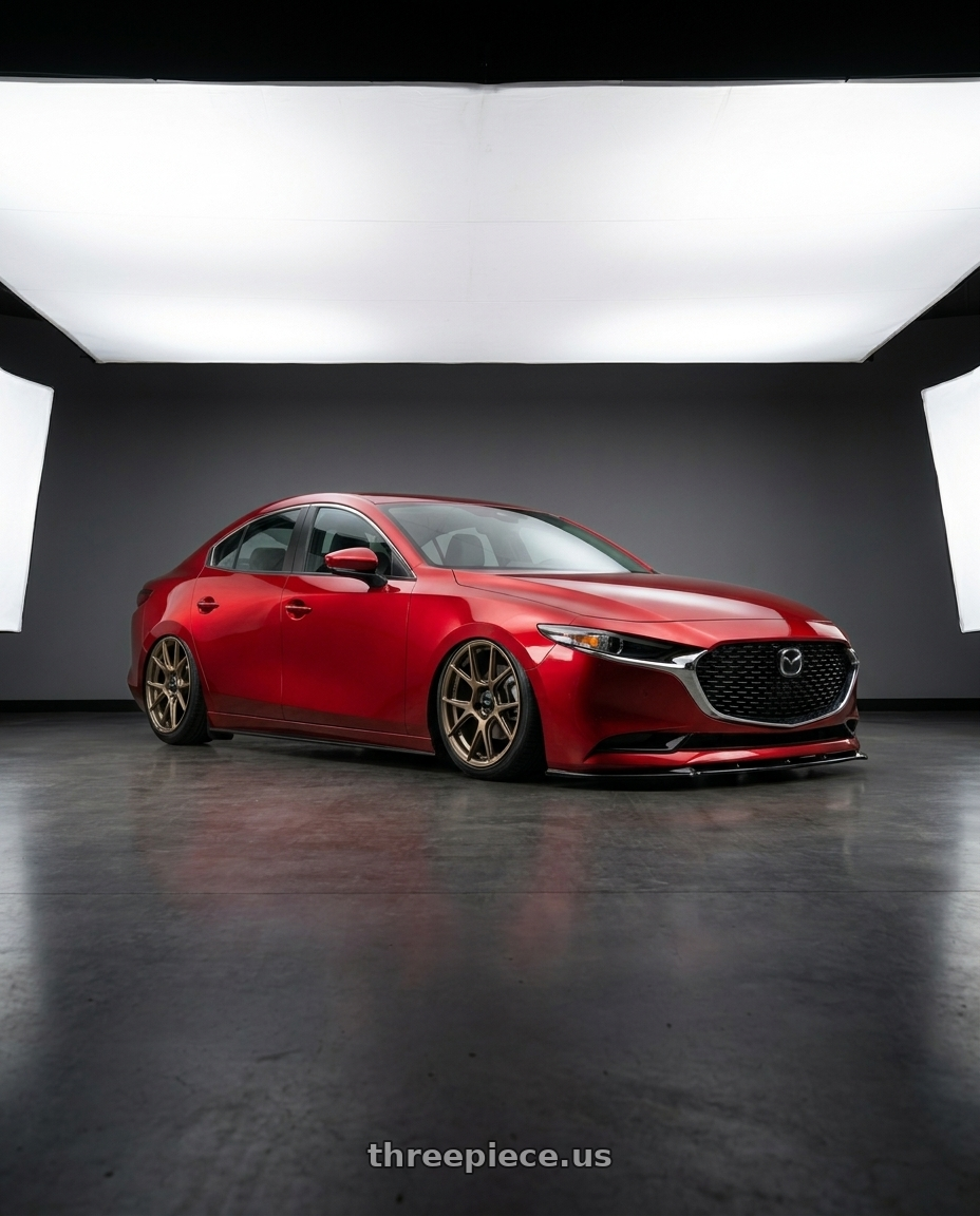 2021 Mazda3 4door with Konig Ampliform 5x114.3 19x9.5+25 Gloss Bronze wheels