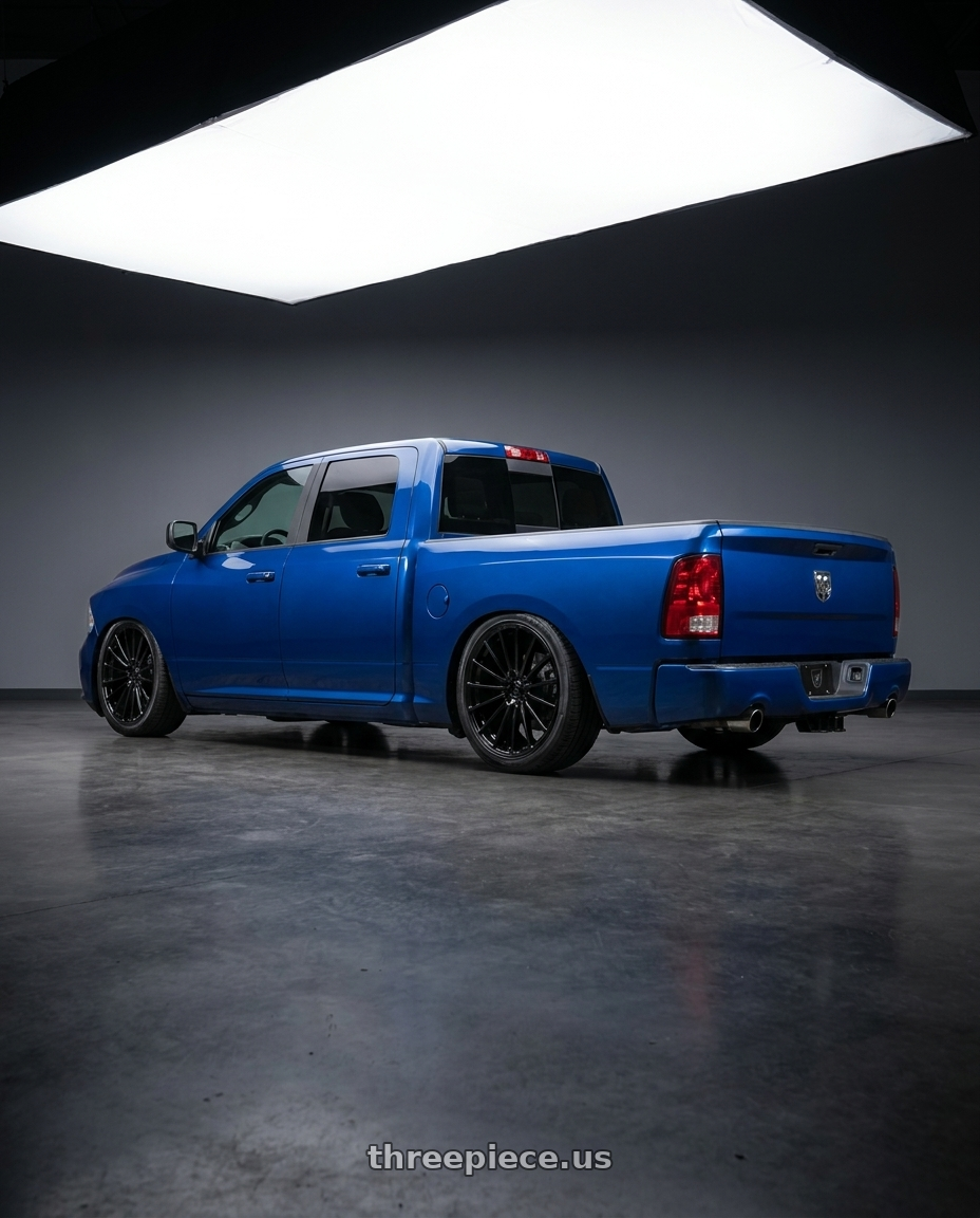 2016 Dodge ram with DOLCE PERFORMANCE GHOST 5x120 20x8.5 +28 Gloss Black wheels rear three quarter view slight stretch tires