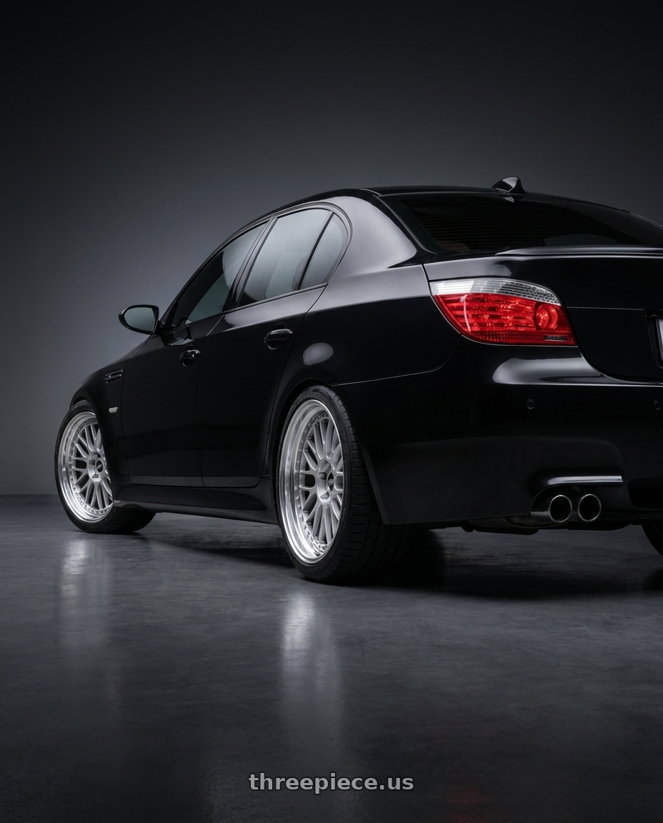 2008 bmw m5 with Work Zistance W10m 5x100 19x9.5+42 w disk Cool Light Silver wheels rear three quarter view square tires
