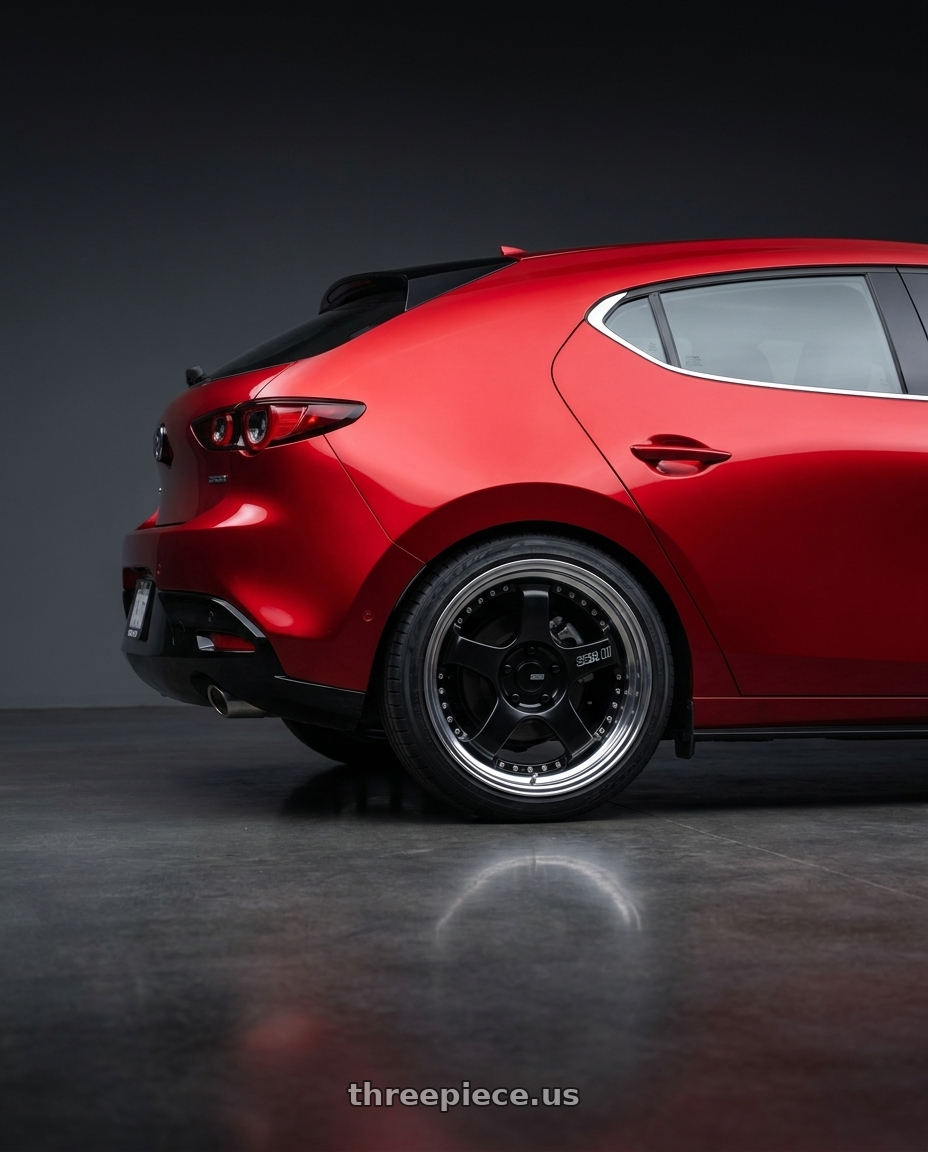 2024 Mazda 3 with SSR Professor SP1 4X100 18X8.5+37 HP Disk Black wheels rear three quarter view slight stretch tires
