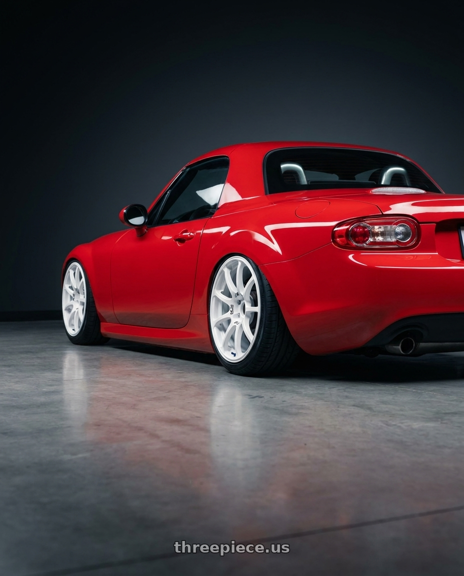 2012 Mazda MX-5 Miata NC with Advan RCIII 5x114.3 17x7+45 White wheels rear three quarter view slight stretch tires