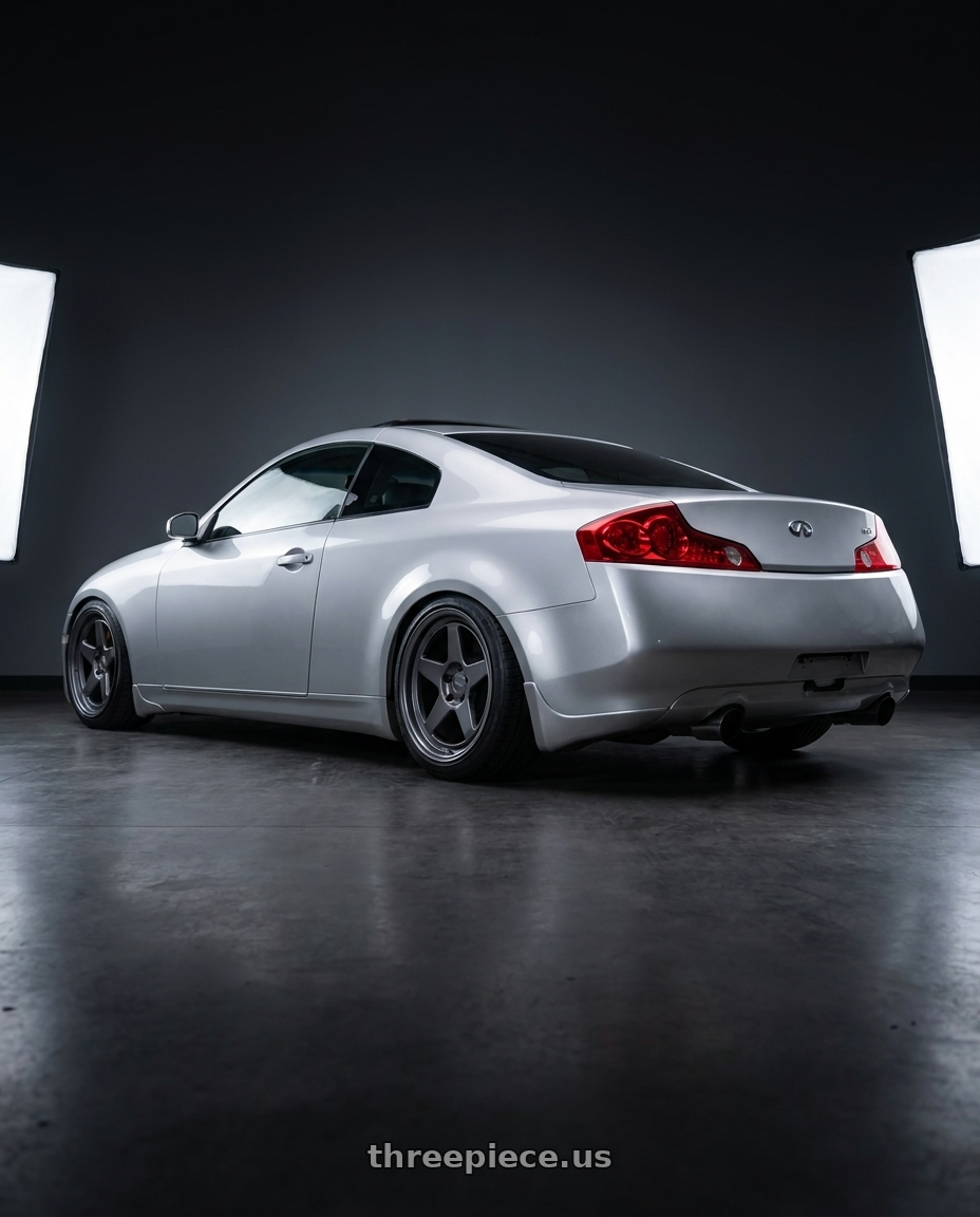 2005 infiniti g35 coupe, silver with Kansei K12G KNP 5x114.3 19x9.5 22 Gunmetal wheels rear three quarter view slight stretch tires