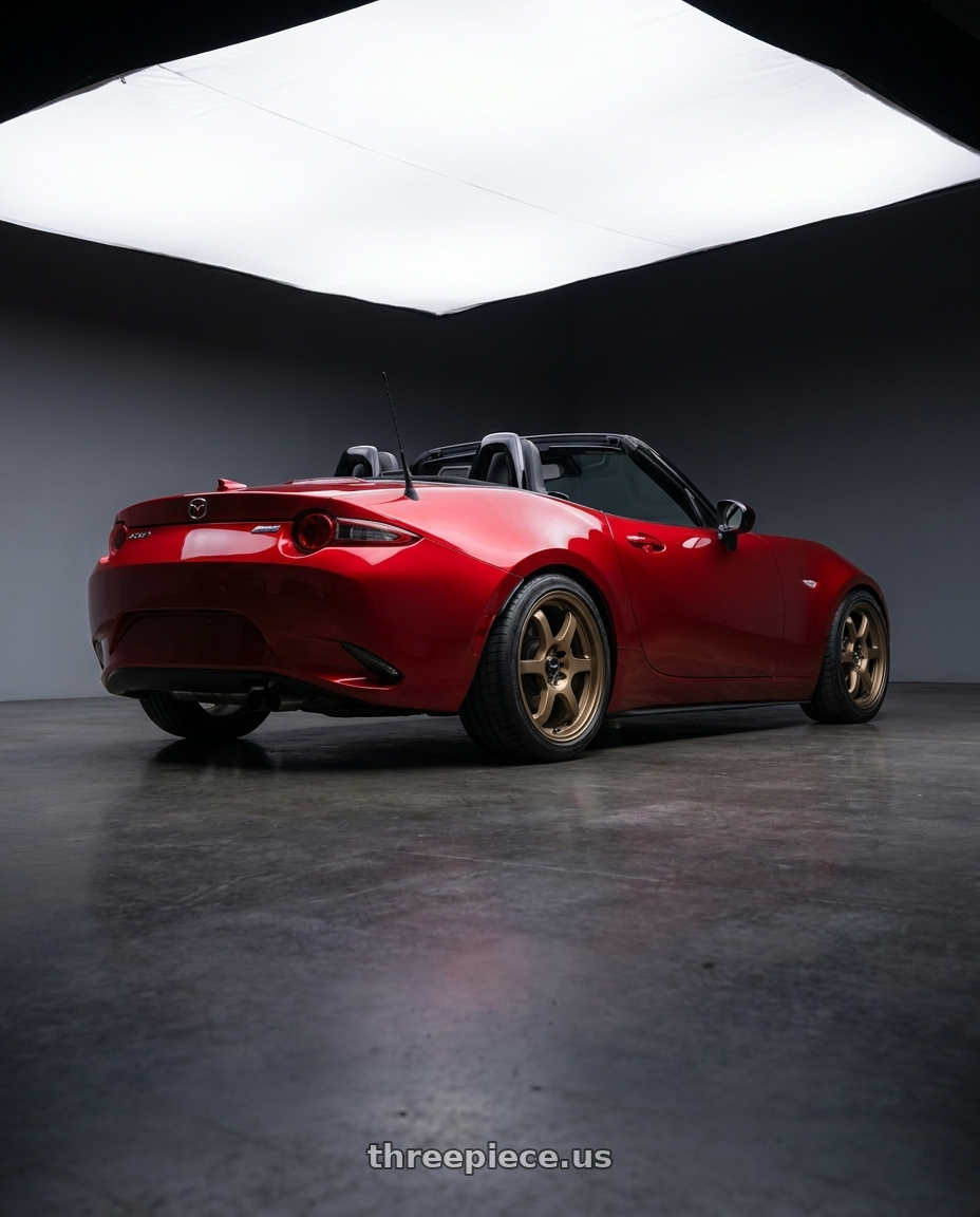 2024 mazda mx5 with Vors LT61 4x100 16x7 +35 Bronze wheels rear three quarter view square tires