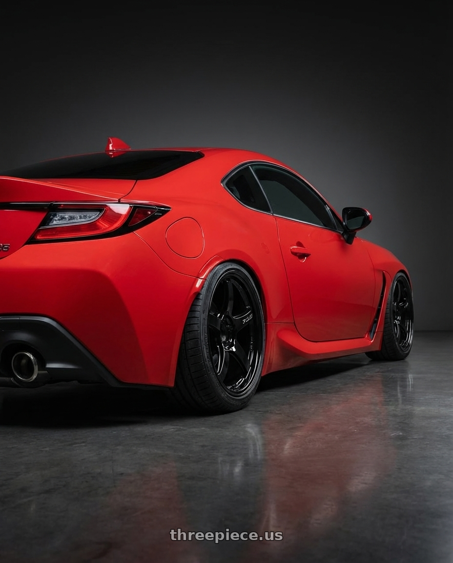 2024 Toyota GR86 with Gram Lights 57CR 5x114.3 18x9.5+22 Glossy Black wheels rear three quarter view slight stretch tires