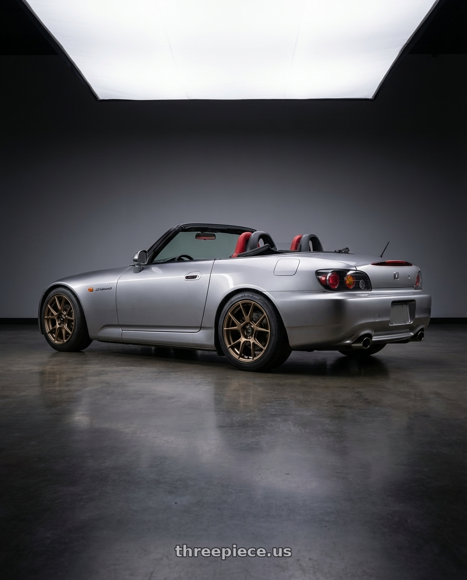 2009 Honda S2000 with Konig Ampliform 5x114.3 17x8+40 Gloss Bronze wheels rear three quarter view square tires