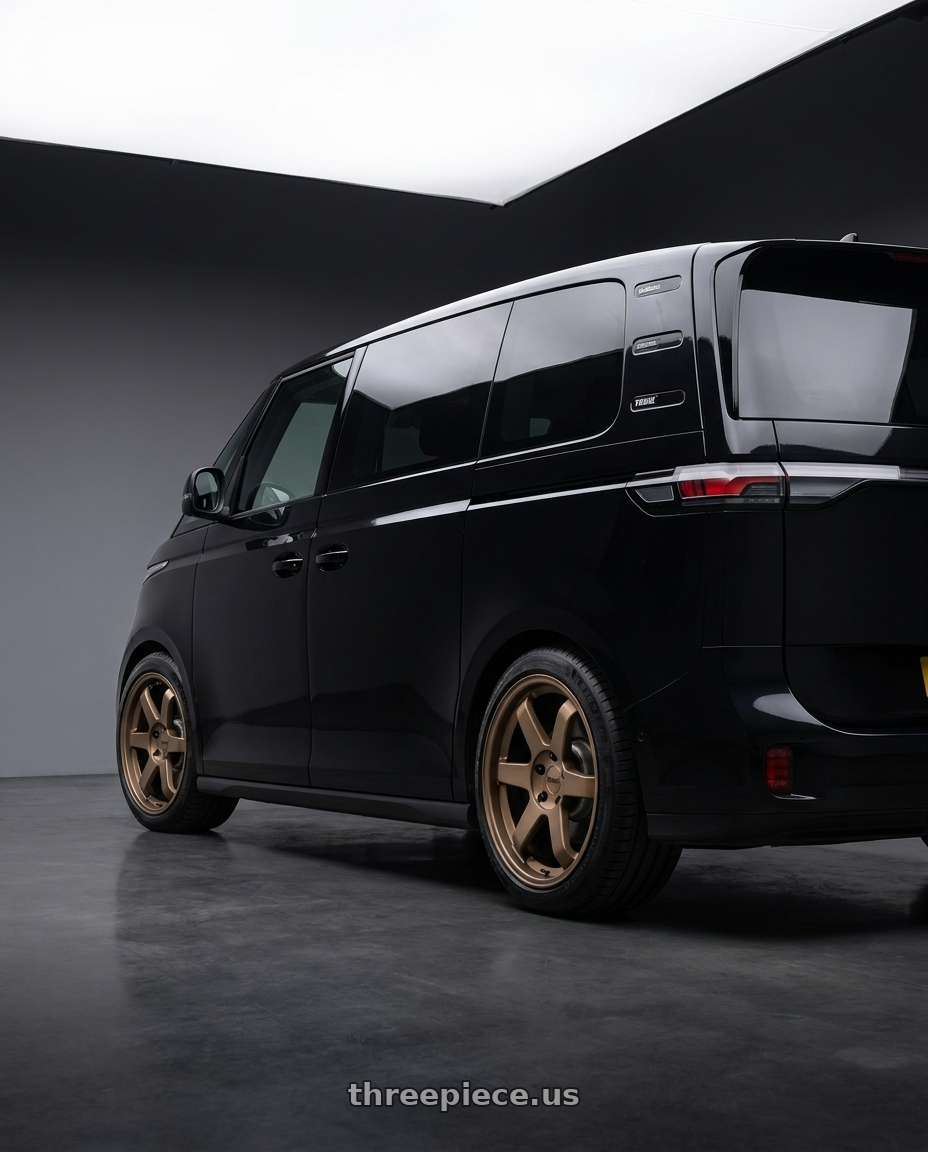 2025 VW ID Buzz with KATANA RACING KR08 5x112 18x8 +40 Matte Bronze wheels rear three quarter view square tires