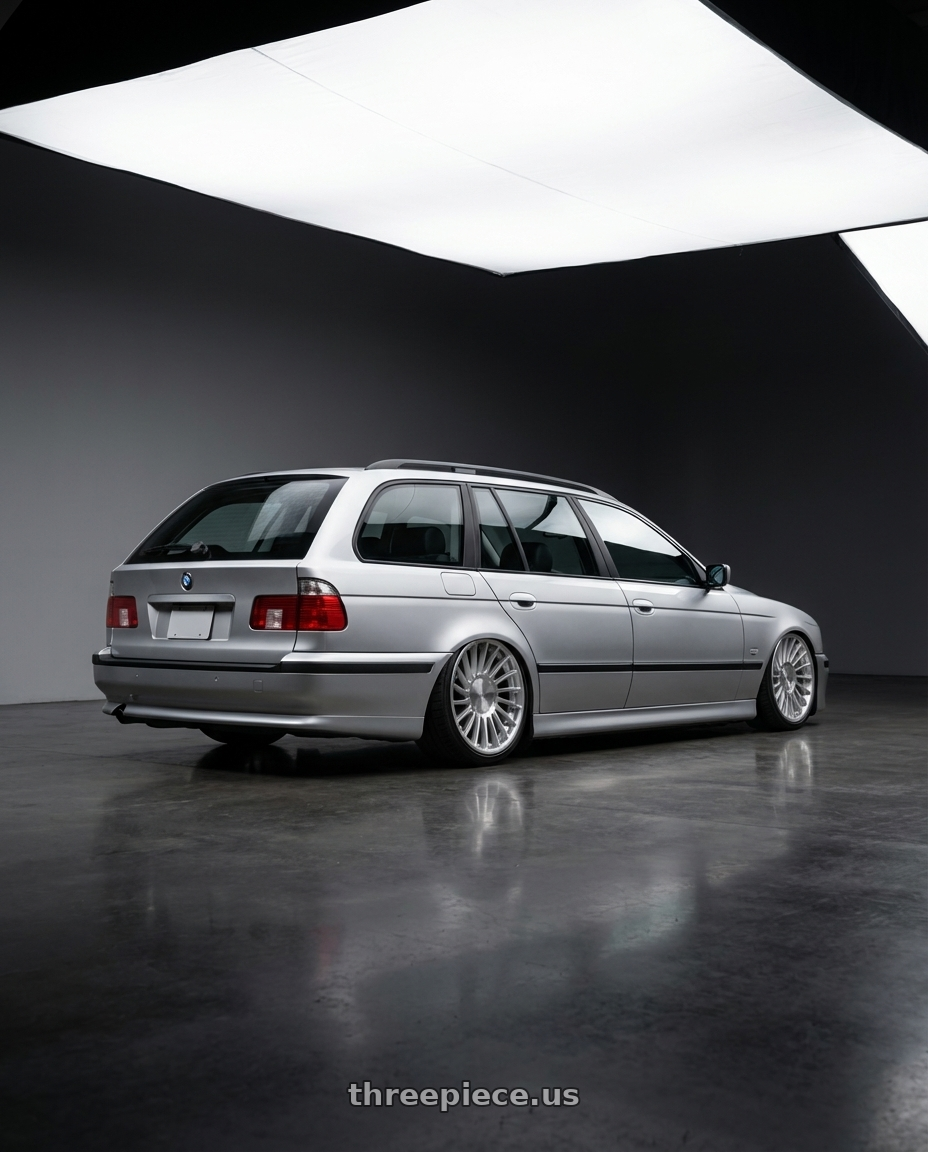 2001 bmw 5 series wagon with Rotiform 1PC R110 BLQ 5X112 19X8.5 +45 GLOSS SILVER MACHINED wheels rear three quarter view extreme stretch tires