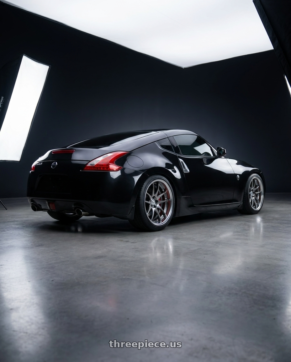 2009 Nissan 370Z with Work Cr 2P 5x114.3 19x10.5 +18 GT Silver wheels rear three quarter view square tires