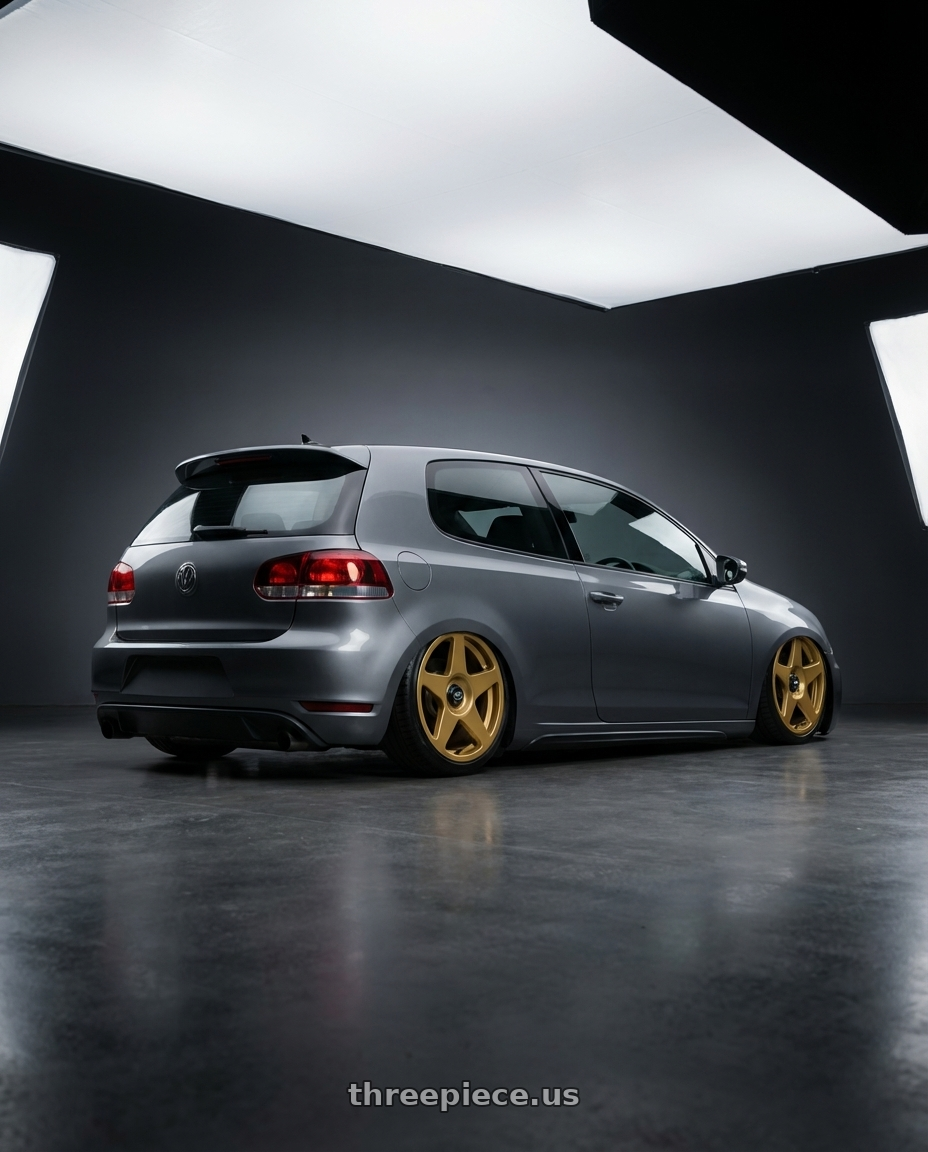2013 Volkswagen GTI MK6 with fifteen52 TARMAC EVO 5x112 / 5x120 18x8.5 +35 GOLD (GLOSS GOLD) wheels rear three quarter view slight stretch tires