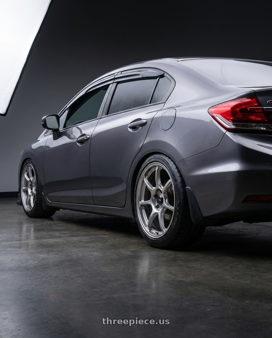 2015 Honda Civic LX with Konig Ultragram 5X114.3 18x8.5+42 Titanium Metallic Knurled Bead wheels rear three quarter view meaty tires