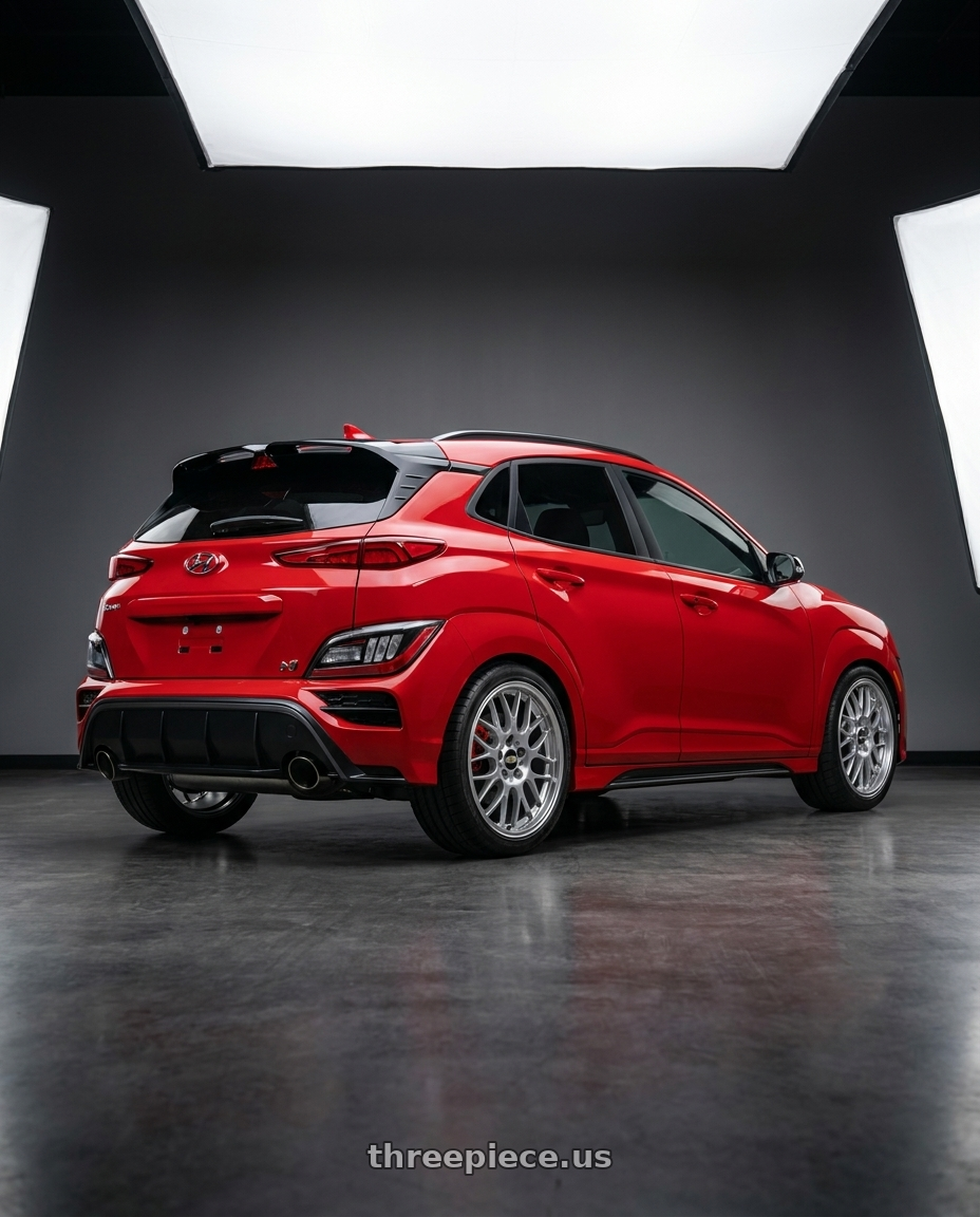 2023 Hyundai Kona N with BBS RG-R 4x100 17x7.0+38 Diamond Silver wheels rear three quarter view square tires