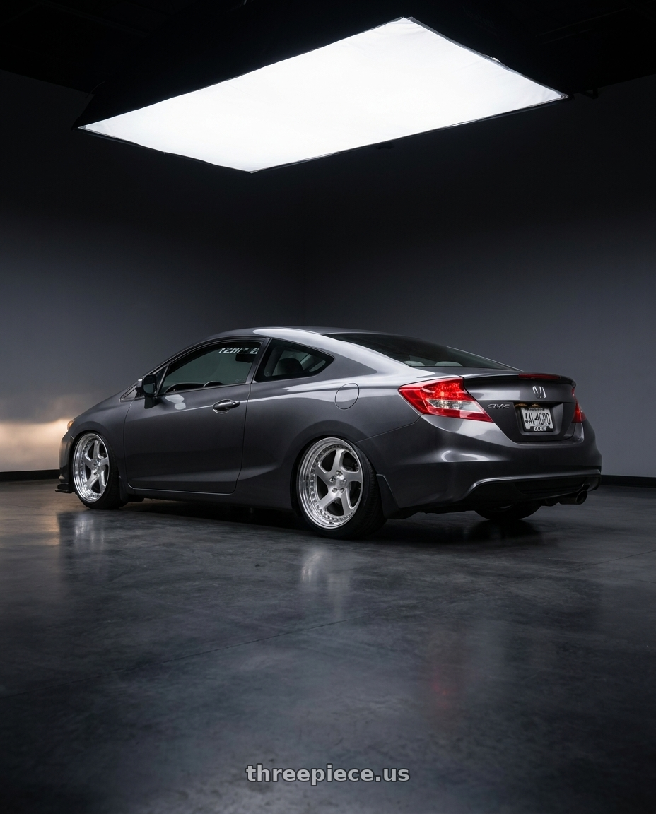 2012 Honda Civic coupe EX with CCW LM5T 5x114.3 16x8.5 +40 Polished wheels rear three quarter view slight stretch tires
