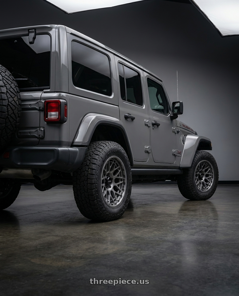 2018 Jeep Wrangler Sport with KMC KM722 TECHNIC 5X127 17X8.5 +0 ANTHRACITE wheels rear three quarter view square tires