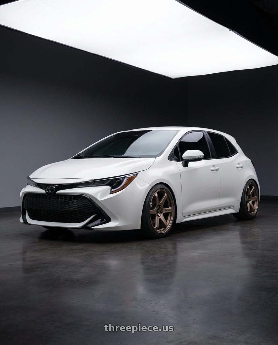 2025 Toyota Corolla Hatchback with Enkei T6R 5x100 17x8+45 Matte Bronze wheels