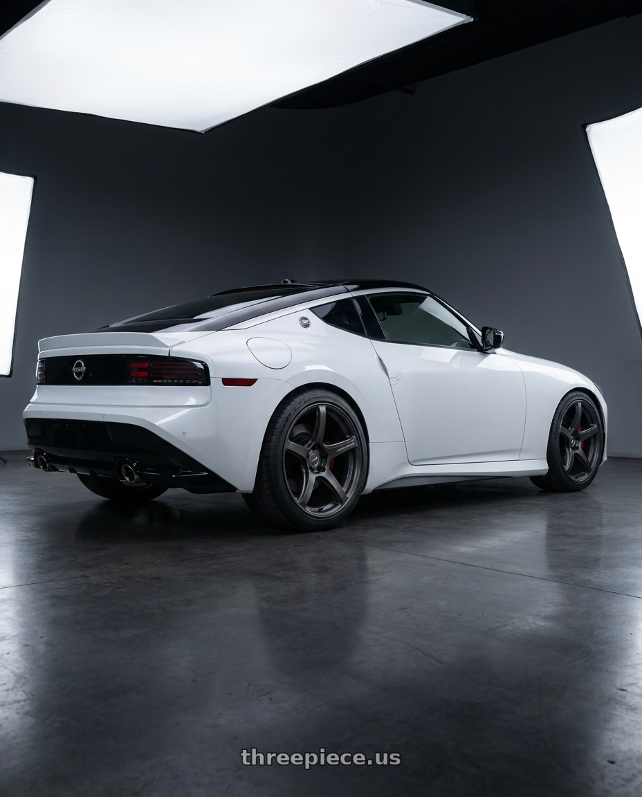 2024 Nissan Z performance with Work Emotion T5r 5x114.3 19x10.5 +15 Matte Graphite wheels rear three quarter view square tires