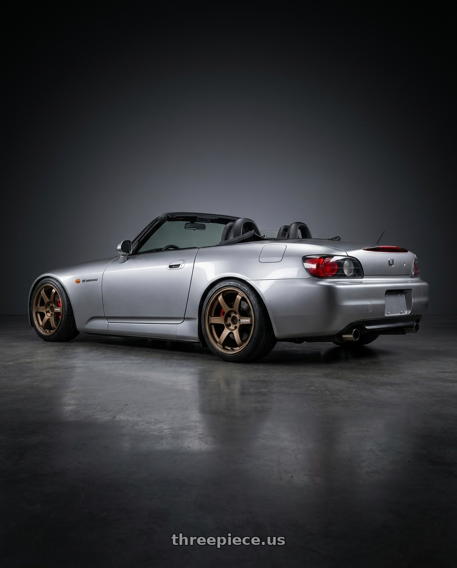 2001 Honda s2000 with Volk Racing TE37 SAGA S-PLUS 5x114.3 17x7.5+48 Bronze wheels rear three quarter view square tires