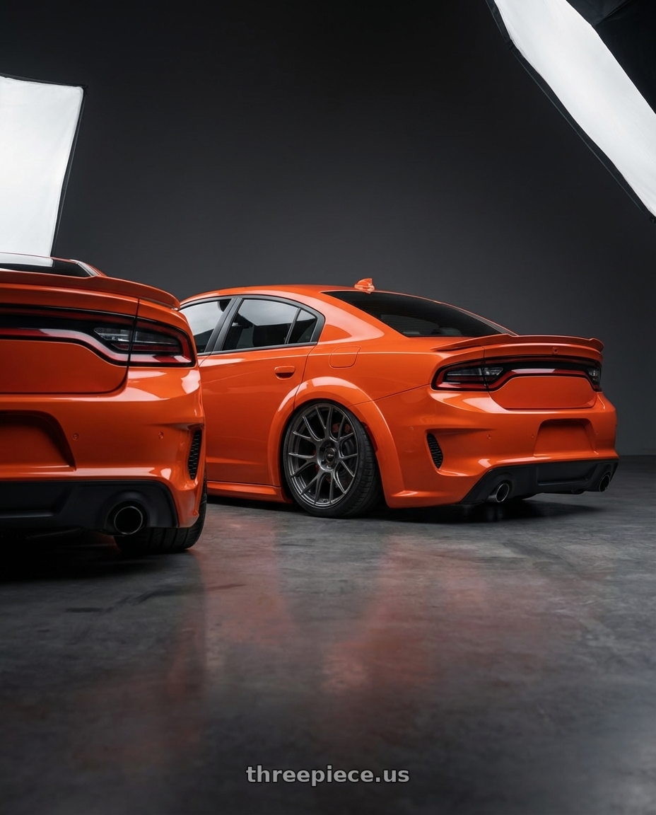 2020 Dodge Charger Widebody with Konig Ampliform 5x115 20x9.5+18 Dark Metallic Graphite wheels rear three quarter view slight stretch tires