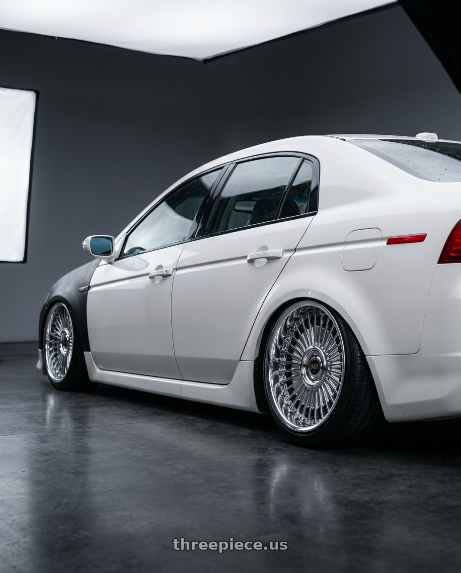 2006 Acura TL with Work Emitz wheels rear three quarter view slight stretch tires