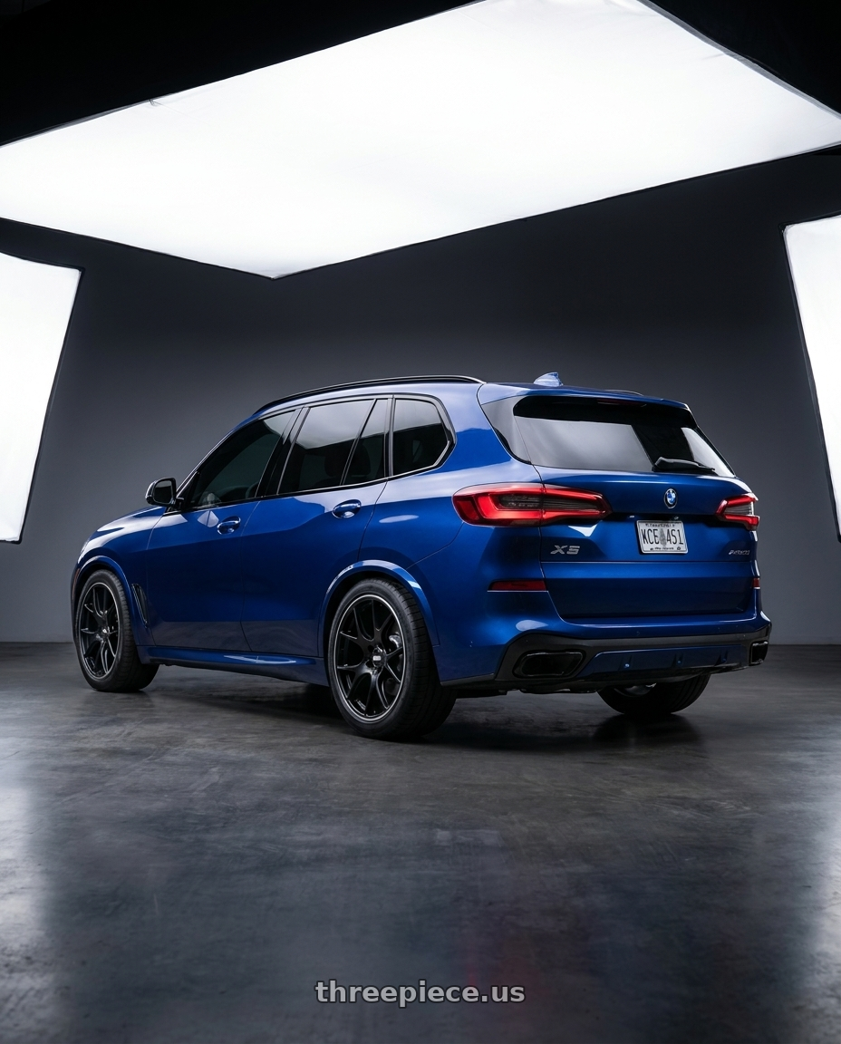 2023 bmw x5 blue with BBS CH-R 5x120 20x10.5 +24 Satin Black Polished Rim Protector wheels rear three quarter view meaty tires