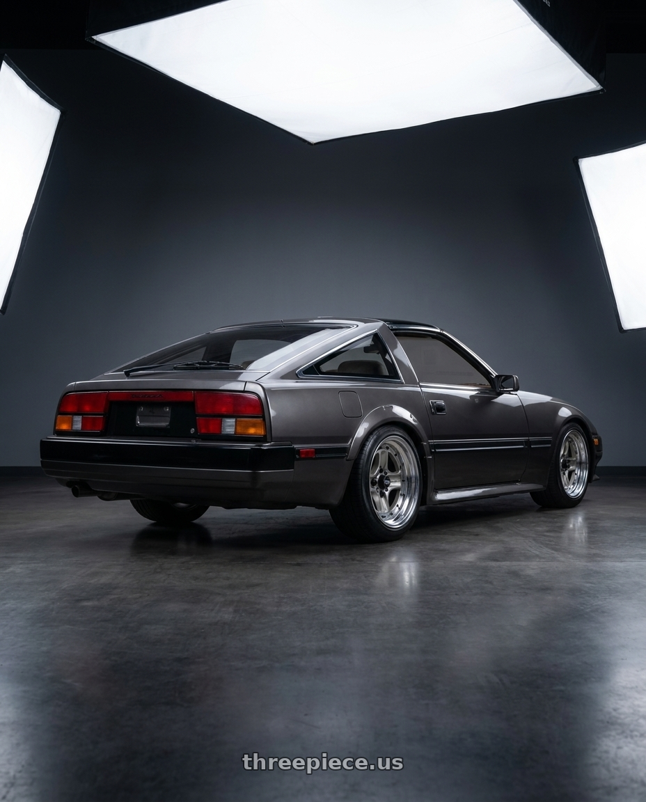 1985 Nissan 300zx  with Work Equip 40 4x114.3 15x9 +7 o disk Brut Silver wheels rear three quarter view slight stretch tires