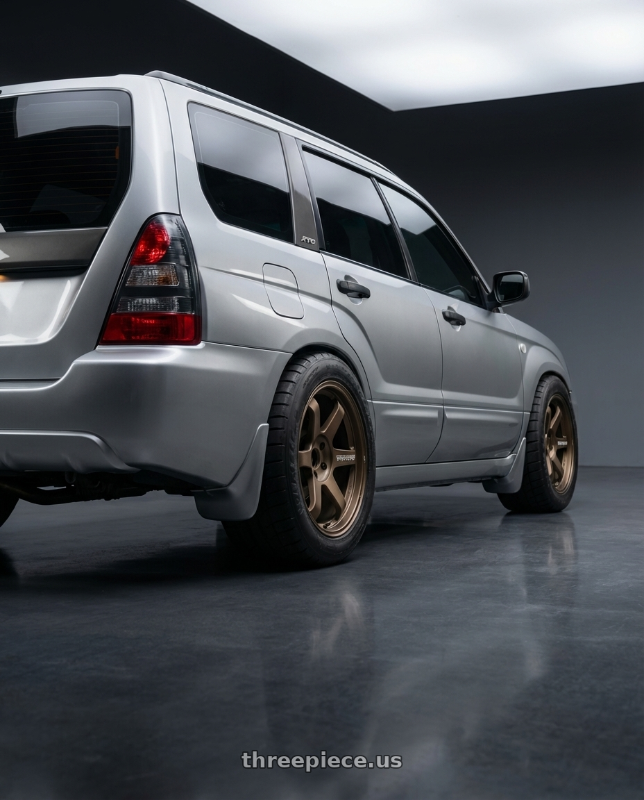 2003 Subaru Forester with Volk Racing TE37 Ultra M Spec 5x112 19x9.5+23 19x10.5+35 Bronze Almite Toyota Supra MK5 Spec wheels rear three quarter view meaty tires