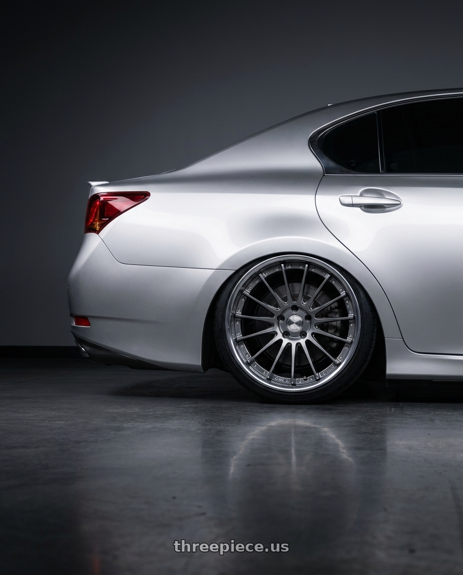 2015 Lexus gs350 with EXECUTOR CV04 5X112 19X13+6 NR Disk Titan Silver wheels rear three quarter view square tires