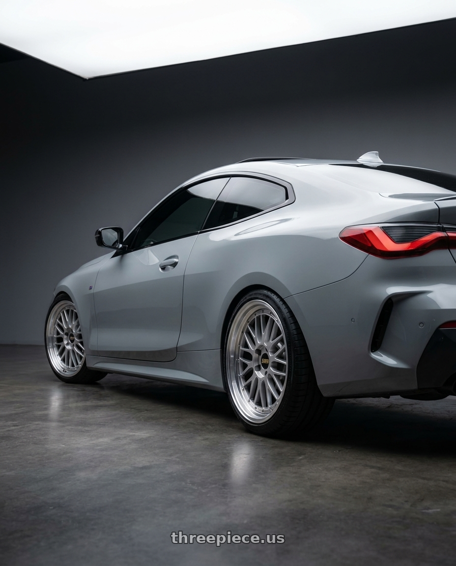 2023 BMW 420i with BBS LM 5x114.3 17x7.5+38 Diamond Silver wheels rear three quarter view square tires