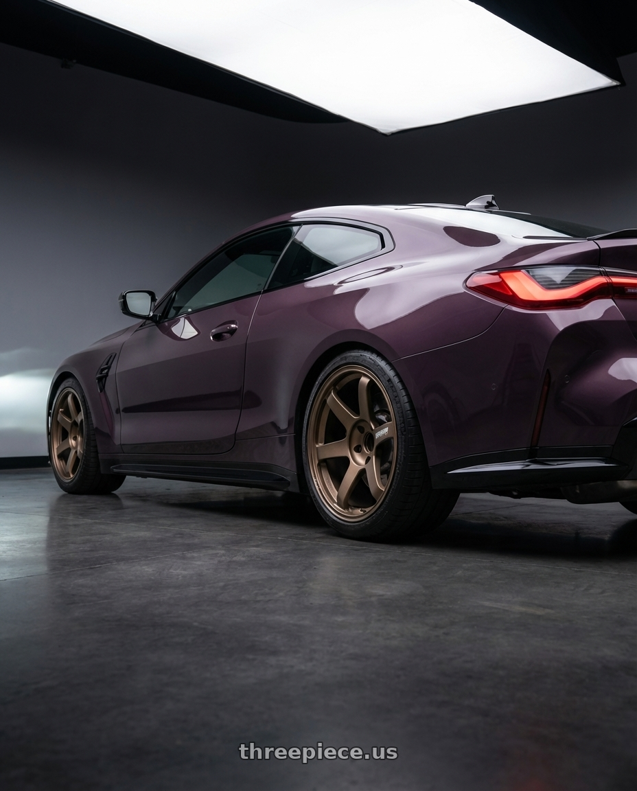 2024 bmw m4 competition sepia 2 with Volk Racing TE37 Saga S-Plus 5x114.3 18x8.5+35 Bronze wheels rear three quarter view square tires