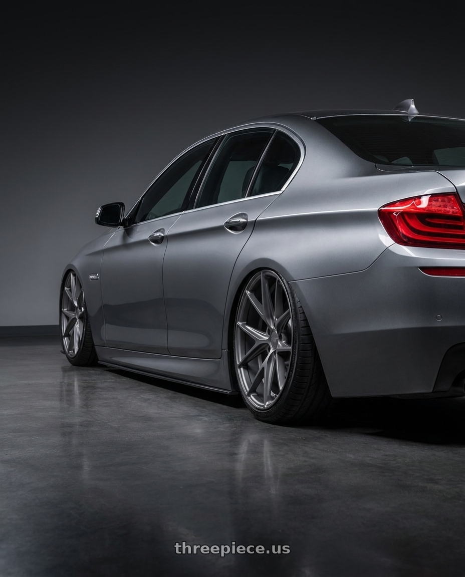 2016 BMW 5 Series F10 with Niche 1PC M116 MISANO 5X120 20X9 +35 MATTE GUN METAL wheels rear three quarter view slight stretch tires