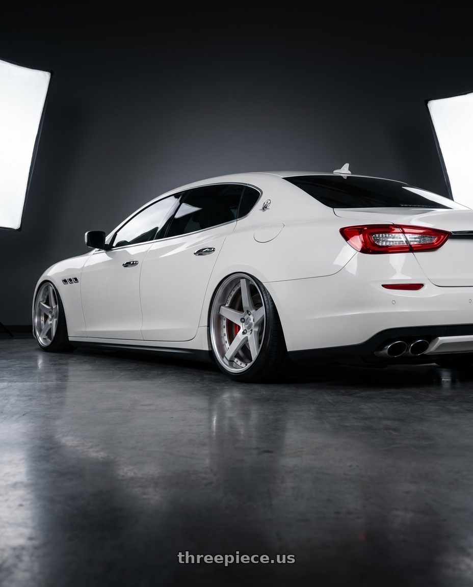 2014 maserati quattroporte gts  with Work Gnosis Gr203 5x114.3 20x11+45 O Disk Matte Silver wheels rear three quarter view slight stretch tires