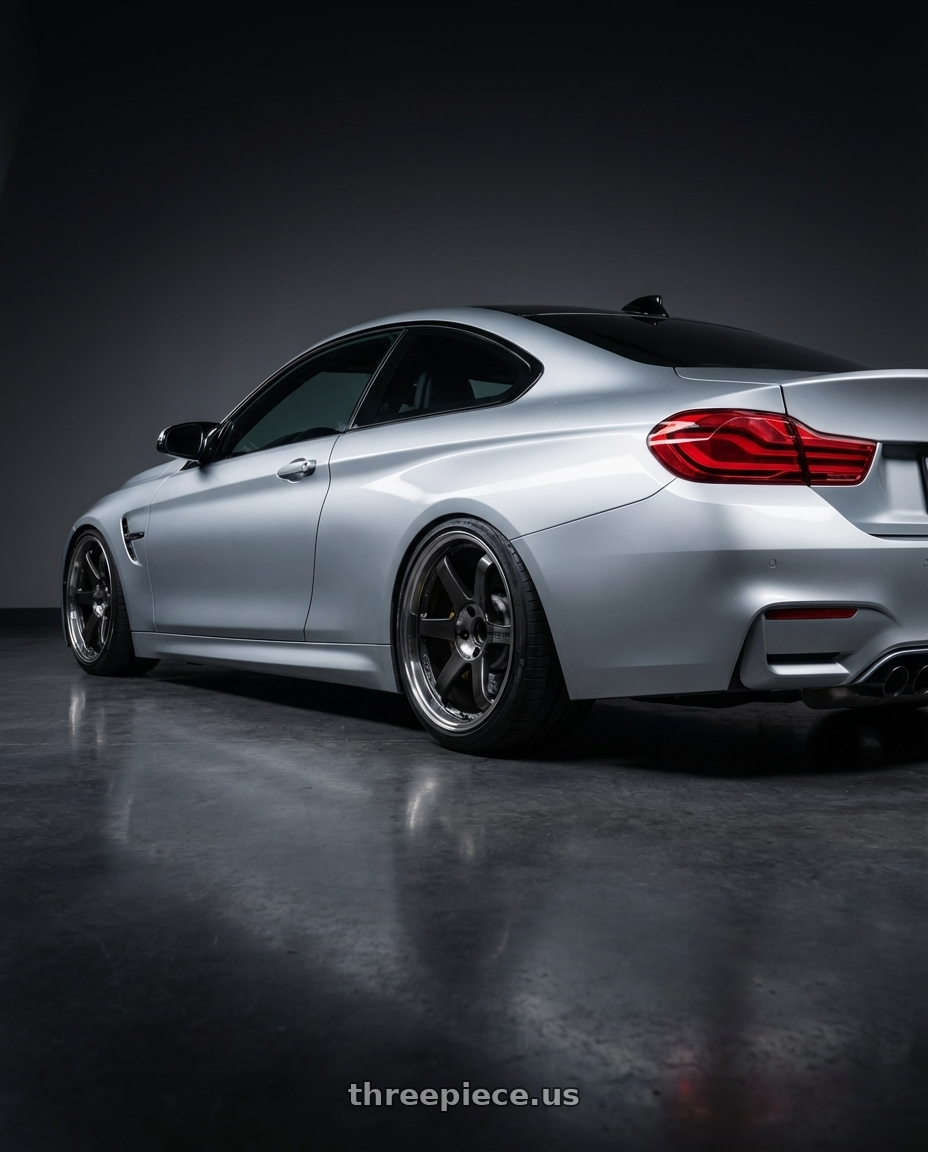 2025 BMW M4 with Volk Racing TE37SL 5x114.3 19x10.5+12 Pressed Double Black wheels rear three quarter view slight stretch tires