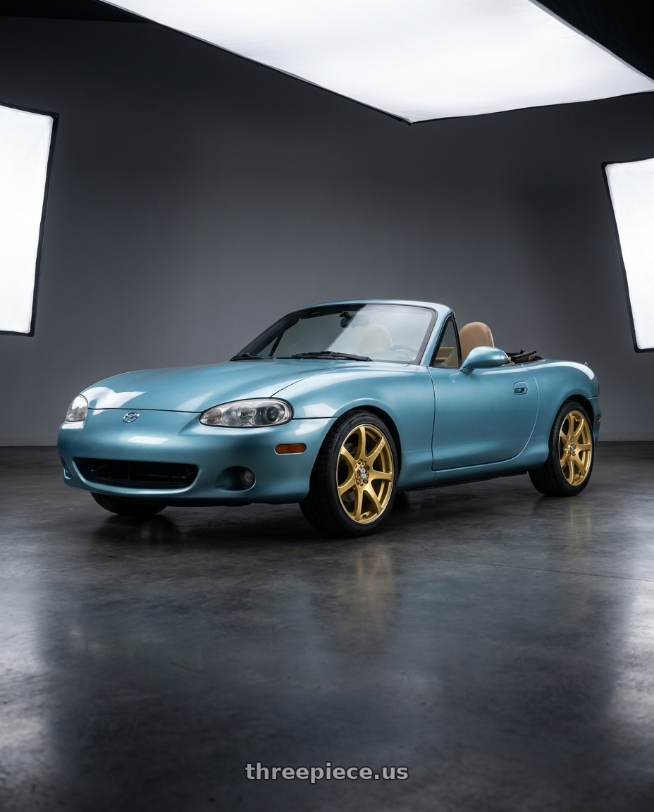 2002 Mazda Miata with RTX Ink 4x100 15x6.5 +40 Gold Machined wheels