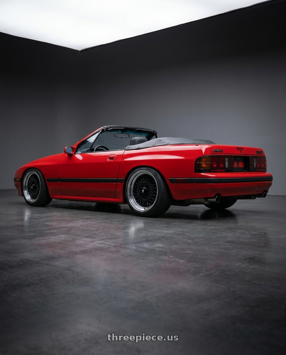 1988 RX-7 FC with Enkei Enkei92 Classic Line 5x114.3 15x7+38 Black wheels rear three quarter view square tires