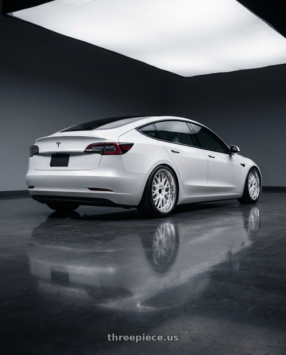 2019 Tesla model 3 rwd with Heritage Wheel OKAYAMA wheels rear three quarter view square tires