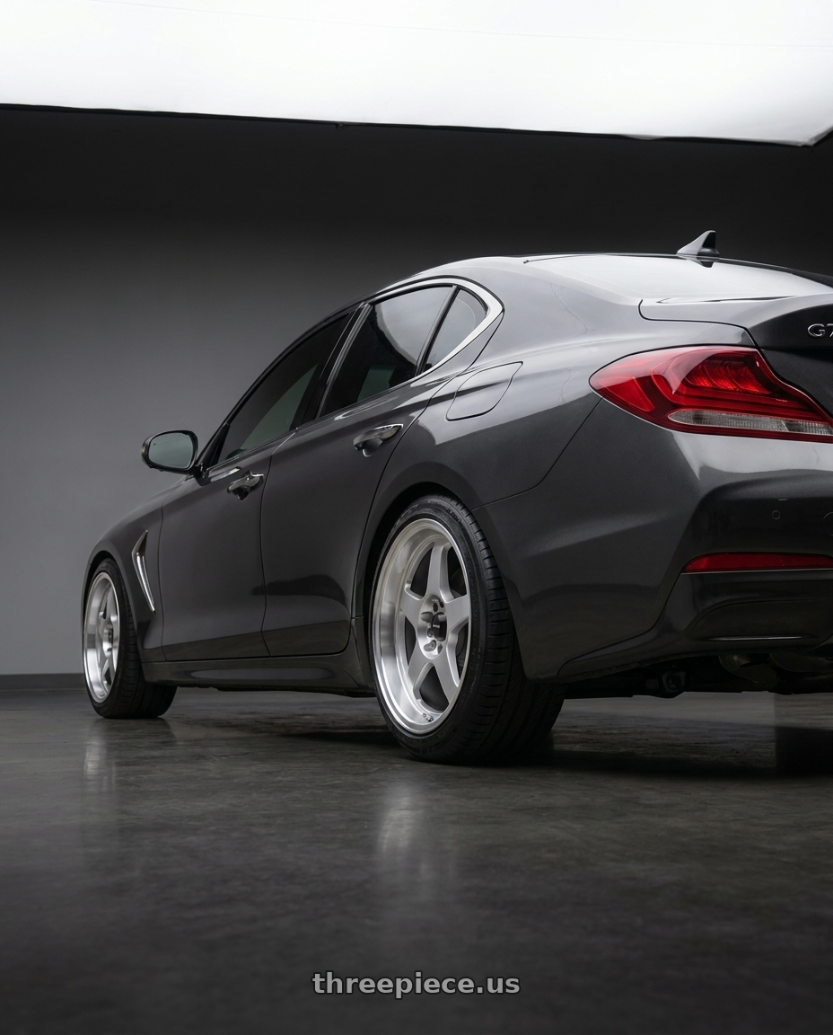2019 Genesis G70 with Vors SP1 5x115 17x8  +35 Silver Machine Face Lip wheels rear three quarter view slight stretch tires