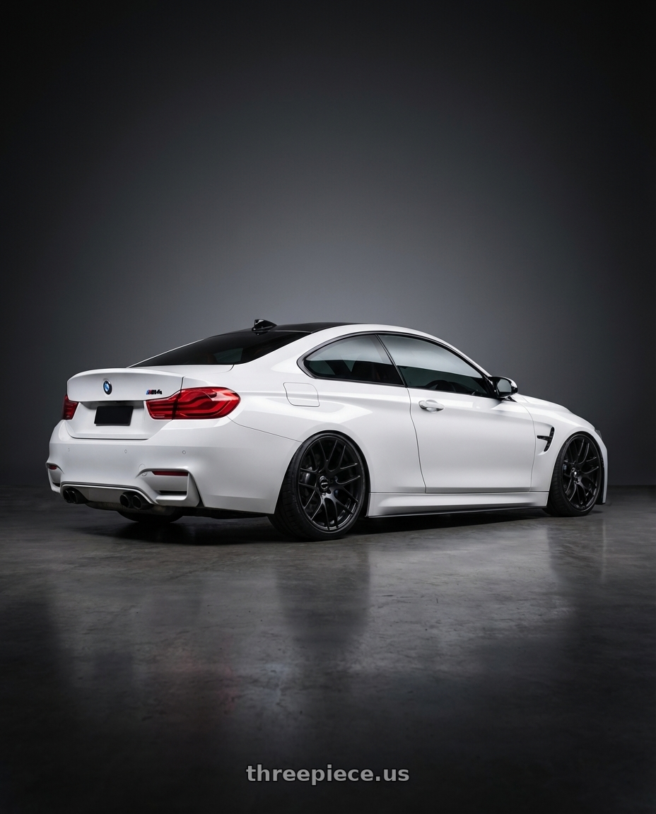 2018 BMW M4 F82 with Avant Garde Wheels M359 5X120 19x10 +38 Matte Black wheels rear three quarter view slight stretch tires