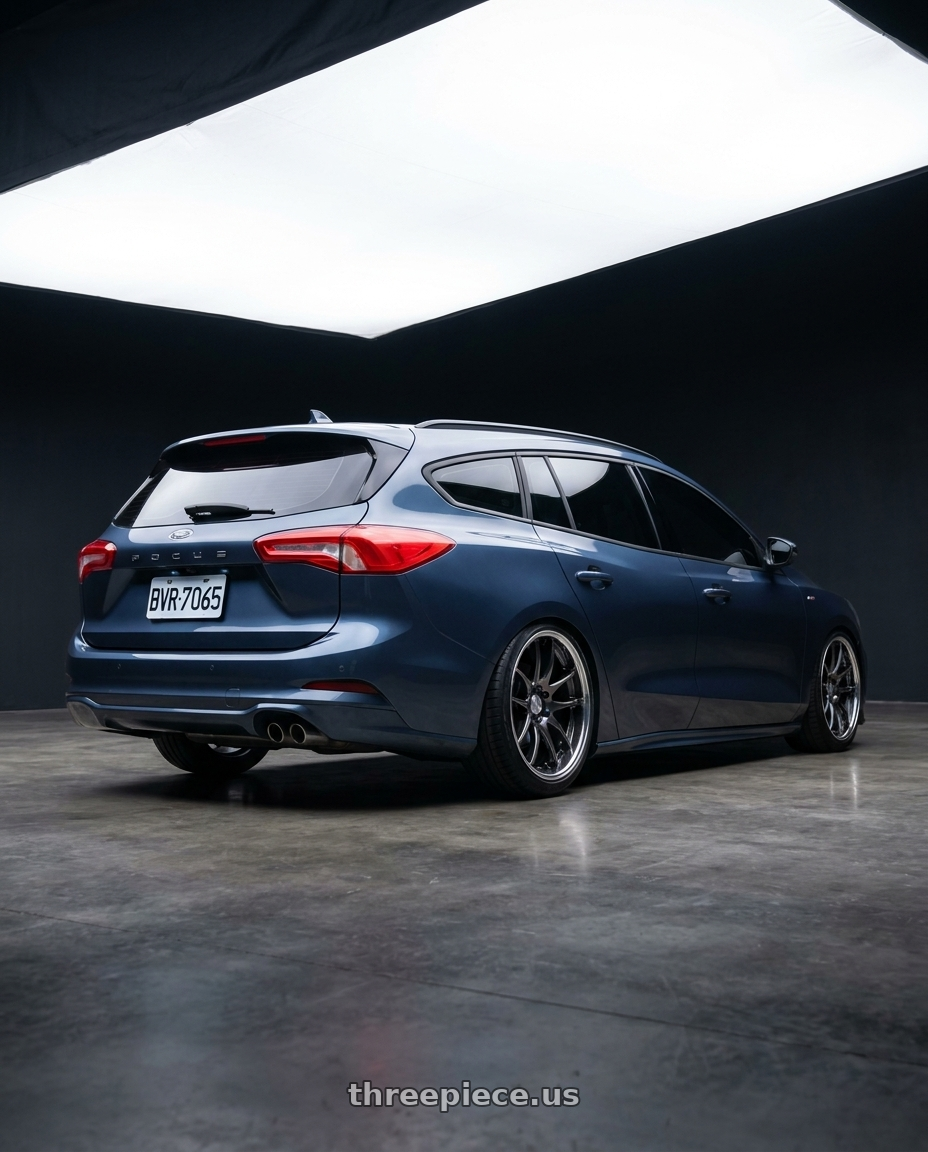 2023 focus wagon 星燄藍 with Work Emotion CR2P wheels rear three quarter view slight stretch tires
