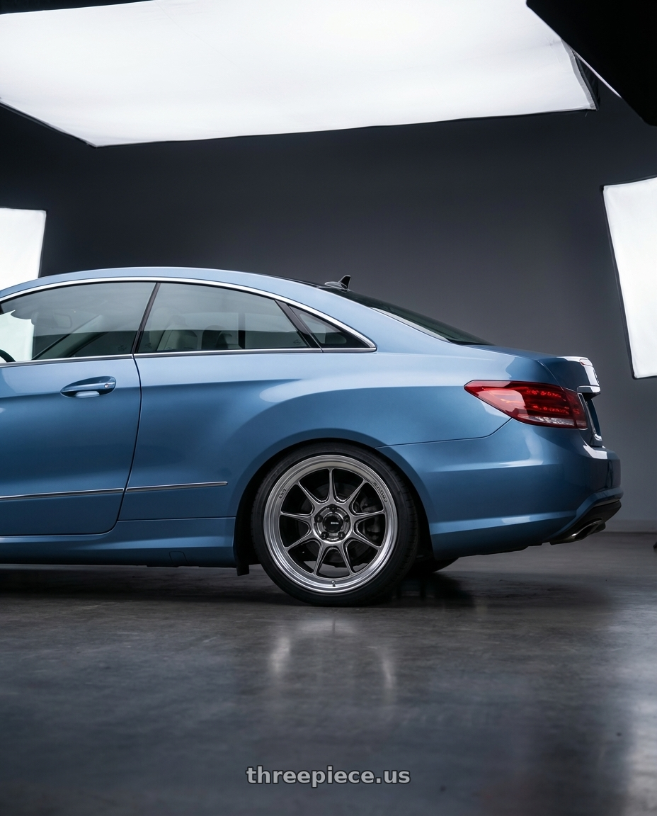 2014 Mercedes-Benz E-Class Coupe C207 with Konig Countergram 5x112 19x11+40 Hyper Chrome / Machined Lip wheels rear three quarter view square tires